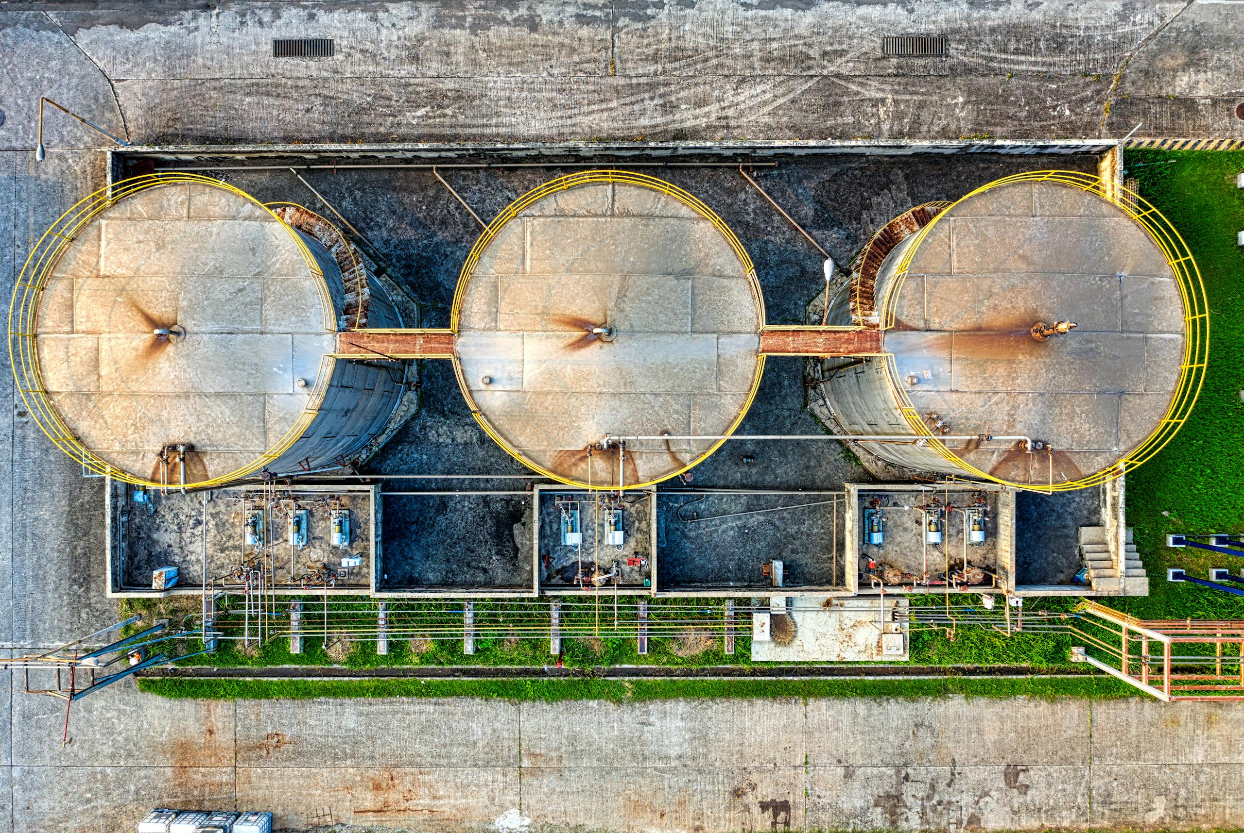 Round metal cylindrical containers at factory